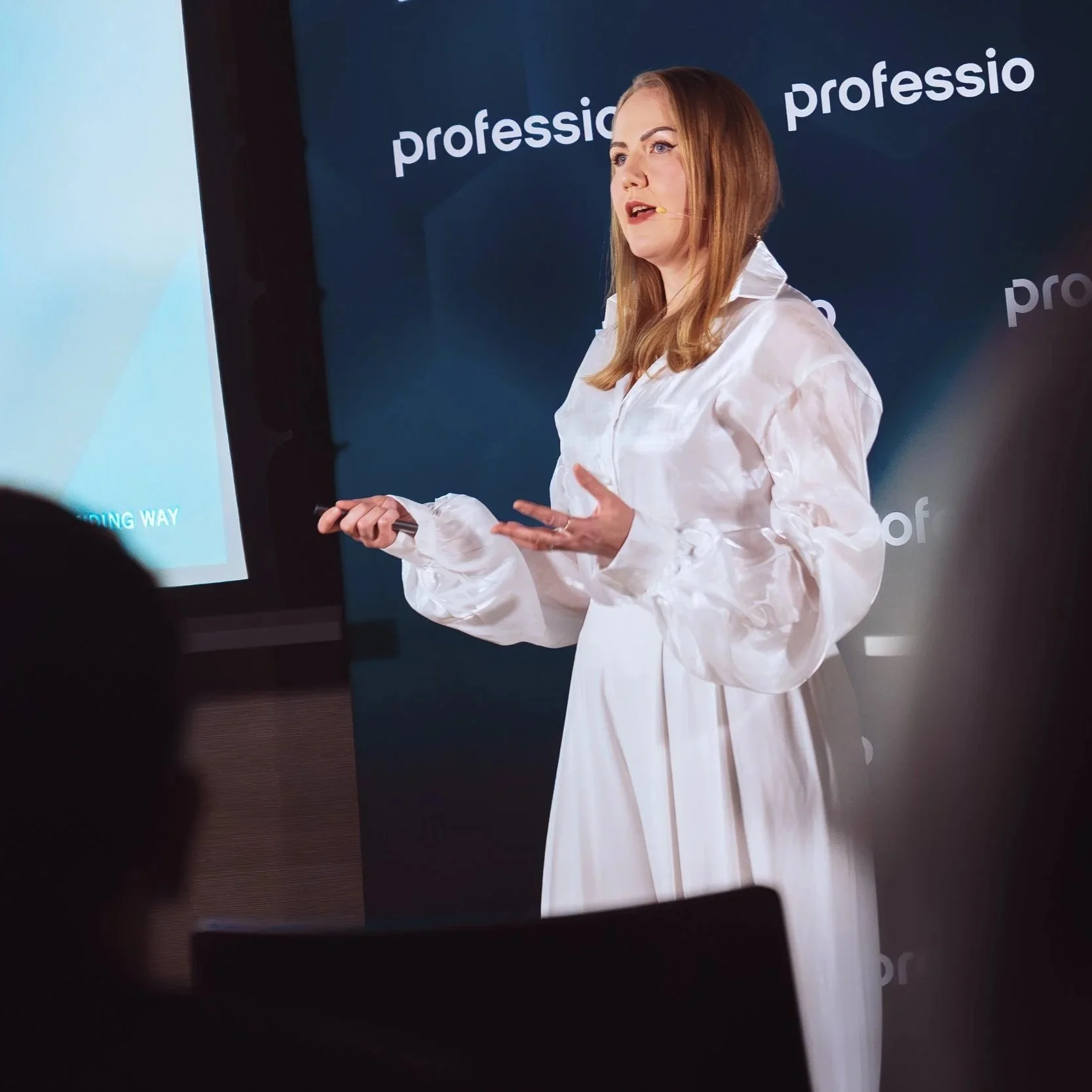 Johanna Valkonen speaking on stage